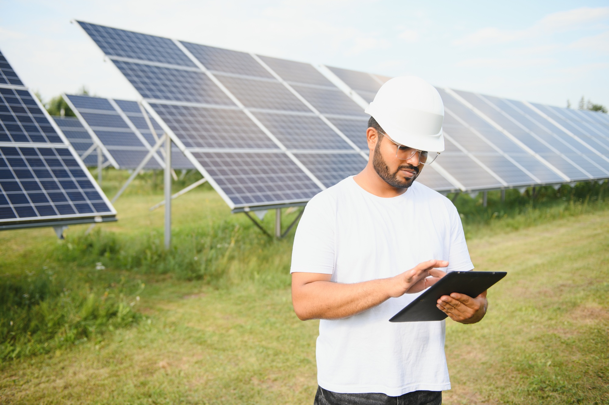 Indian Engineer near solar panel